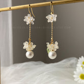Floral Pearl Dangle earrings, Pearl drop earrings with delicate white flowers, unique wedding bridesmaid earrings
